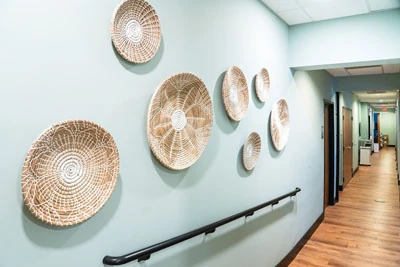decorations lining the walls at Penterson & Booth Family and Cosmetic Dentistry