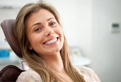 woman smiling during her dental visit to Penterson & Booth Family and Cosmetic Dentistry