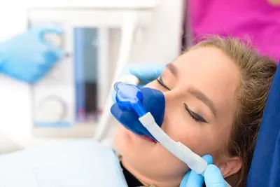patient asleep during her dental procedure